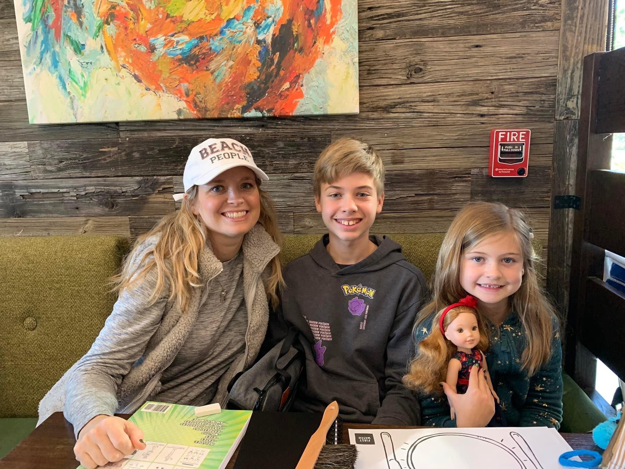 Amanda and kids in restaurant