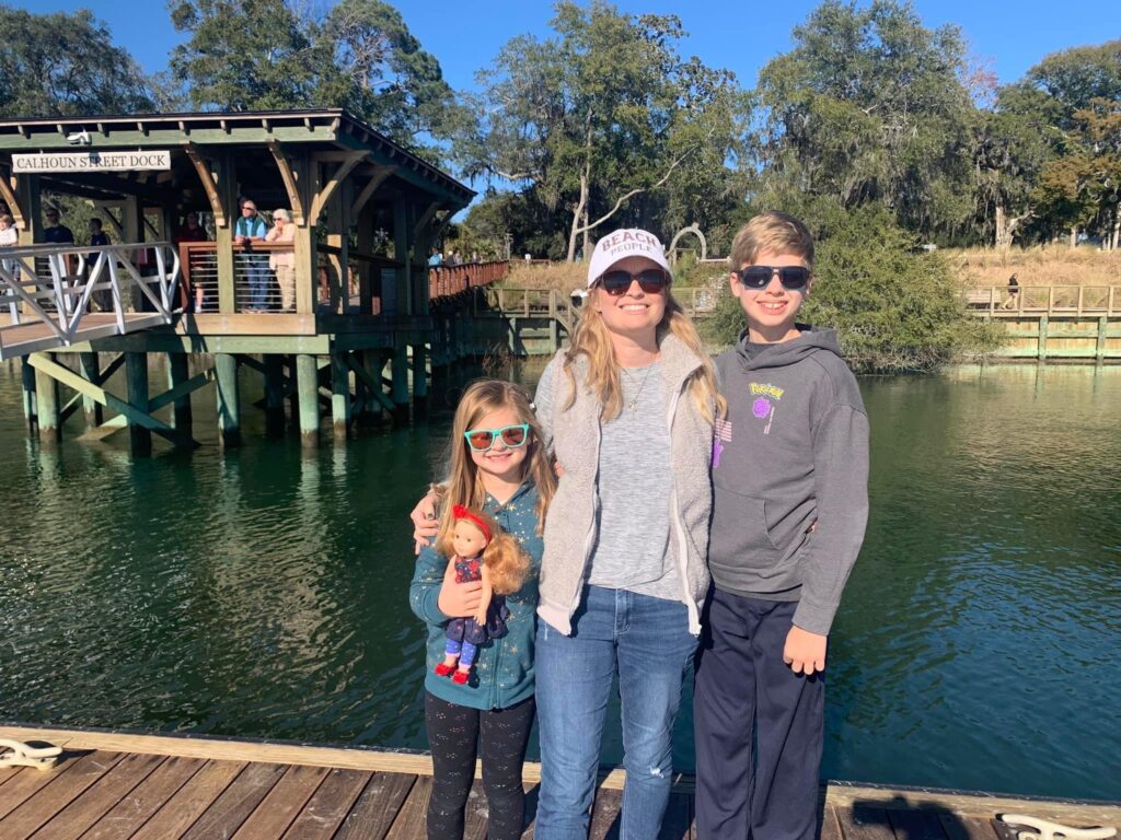 Amanda and kids on dock with water in background